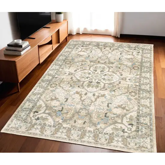 Beige And Ivory Medallion Area Rug Photo 1