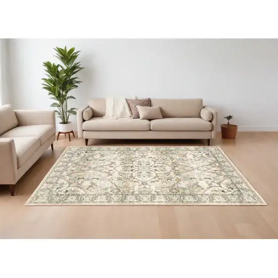 Beige And Ivory Medallion Area Rug Photo 1