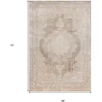 Photo of Beige and Ivory Medallion Area Rug