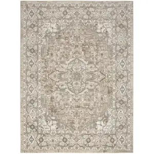 Photo of Beige and Ivory Medallion Power Loom Distressed Area Rug