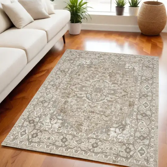 Beige and Ivory Medallion Power Loom Distressed Area Rug Photo 1