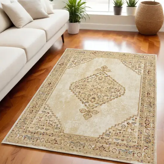 Beige and Ivory Medallion Power Loom Distressed Area Rug Photo 1