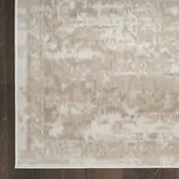 Photo of Beige and Ivory Medallion Power Loom Distressed Area Rug