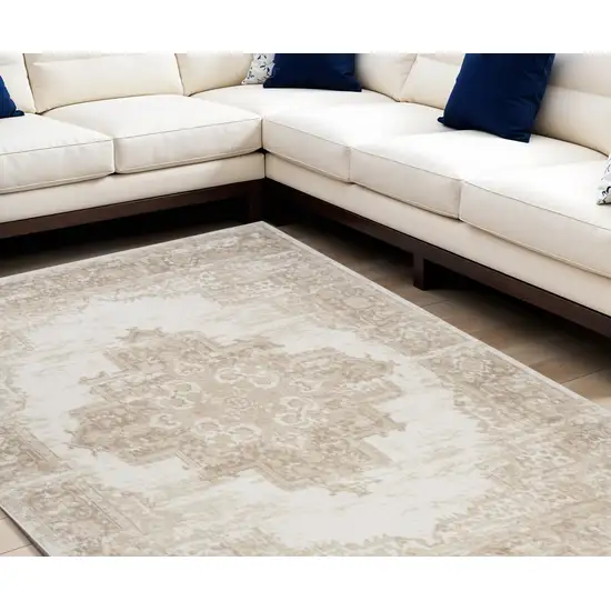 Beige and Ivory Medallion Power Loom Distressed Area Rug Photo 1