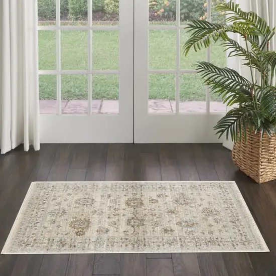 Beige and Ivory Oriental Power Loom Distressed Area Rug With Fringe Photo 7