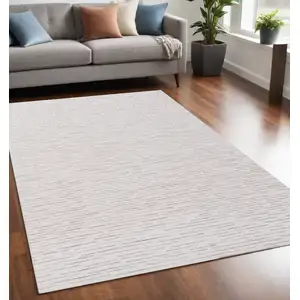 Photo of Beige and Ivory Wool Striped Hand Tufted Area Rug