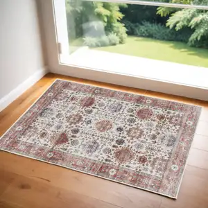 Photo of Beige and Orange Oriental Distressed Non Skid Area Rug