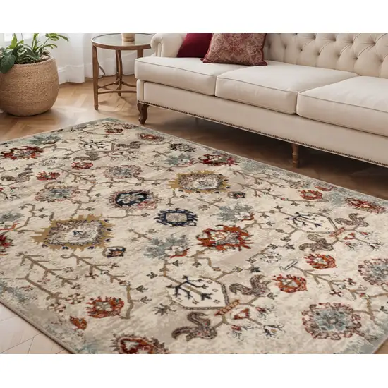 Beige Rust and Navy Oriental Power Loom Area Rug Photo 1