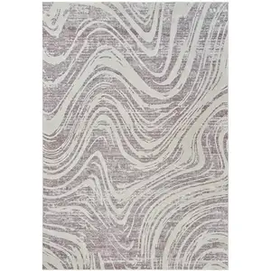 Photo of Beige and Purple Abstract Distressed Area Rug