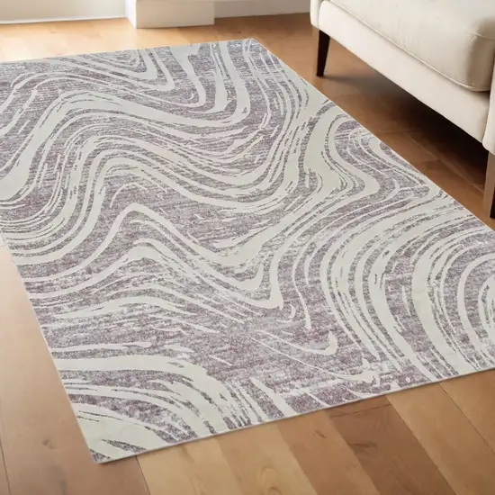 Beige and Purple Abstract Distressed Area Rug Photo 1