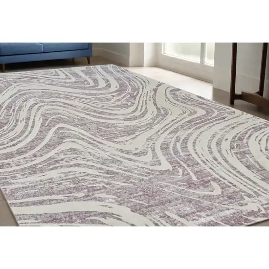 Beige and Purple Abstract Distressed Area Rug Photo 1