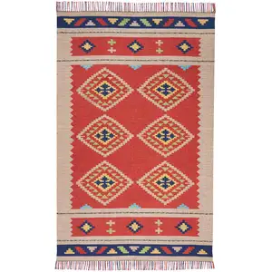 Photo of Beige and Red Southwestern Handmade Area Rug With Fringe