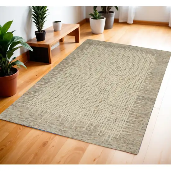 Beige and Tan Wool Abstract Area Rug Photo 1