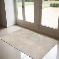 Photo of Beige and White Abstract Non Skid Area Rug