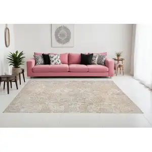 Photo of Beige and White Abstract Non Skid Area Rug