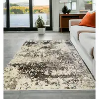 Photo of Black Abstract Distressed Area Rug With Fringe