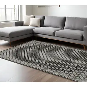 Photo of Black And Gray Diamond Area Rug With Fringe