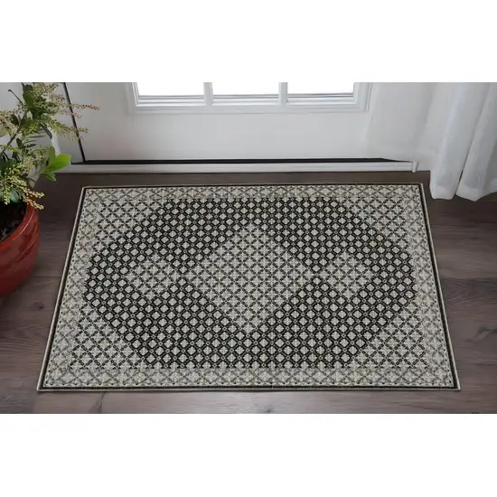 Black And Gray Diamond Area Rug With Fringe Photo 1