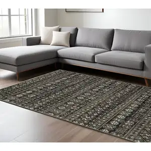 Photo of Black And Gray Tribal Area Rug With Fringe