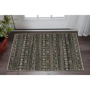 Photo of Black And Gray Tribal Area Rug With Fringe