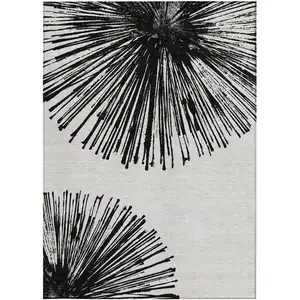 Photo of Black And Ivory Abstract Washable Indoor Outdoor Area Rug