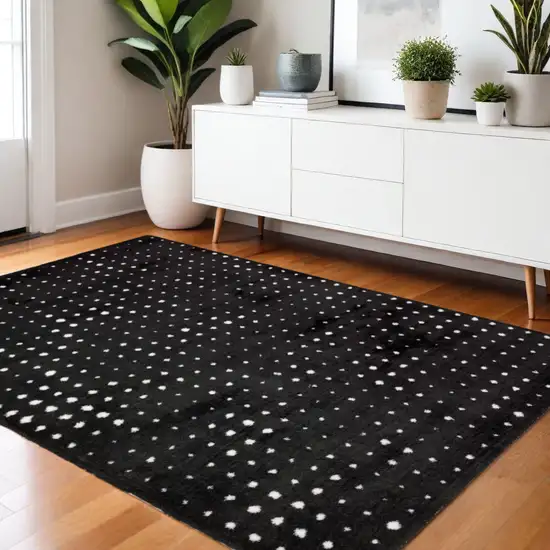 Black And Ivory Geometric Area Rug Photo 1