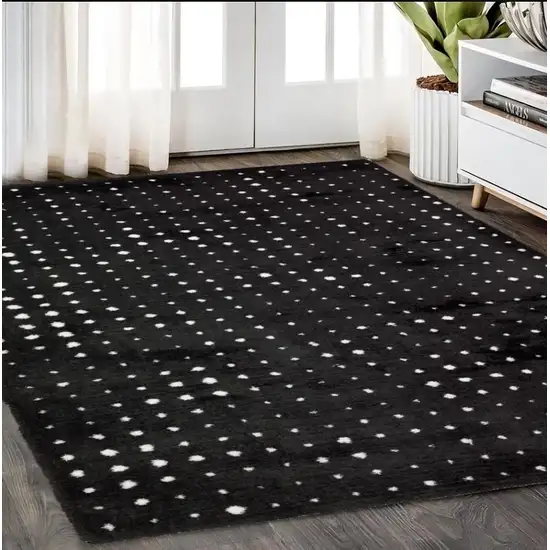 Black And Ivory Geometric Area Rug Photo 1