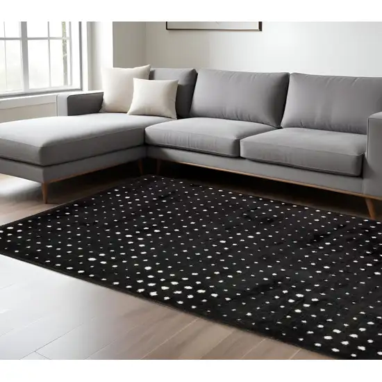 Black And Ivory Geometric Area Rug Photo 1