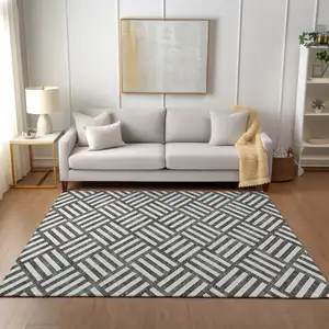 Photo of Black And Ivory Geometric Washable Indoor Outdoor Area Rug