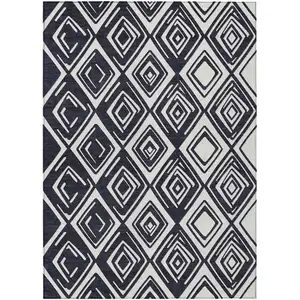 Photo of Black And Ivory Geometric Washable Indoor Outdoor Area Rug