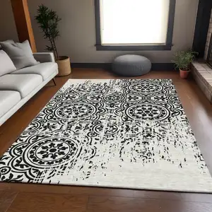 Photo of Black And Ivory Medallion Washable Indoor Outdoor Area Rug