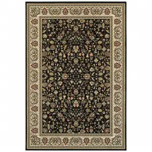 Photo of Black And Ivory Oriental Power Loom Stain Resistant Area Rug