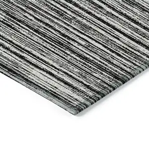 Photo of Black And Ivory Striped Washable Indoor Outdoor Area Rug