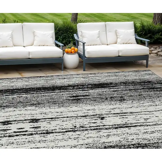 Black And Ivory Striped Washable Indoor Outdoor Area Rug Photo 1