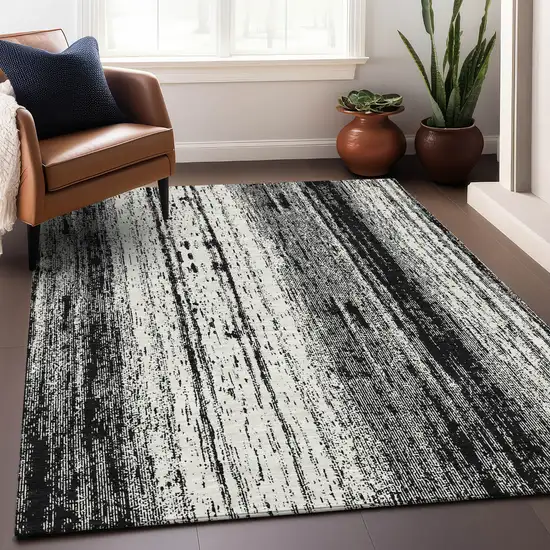 Black And Ivory Striped Washable Indoor Outdoor Area Rug Photo 9