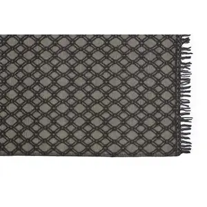 Photo of Black And Ivory Wool Geometric Hand Woven Area Rug With Fringe