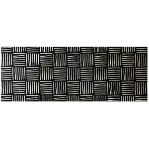 Photo of Black And Off White Abstract Machine Tufted Runner Rug With UV Protection