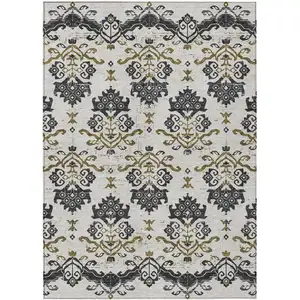 Photo of Black Beige And Gold Oriental Washable Indoor Outdoor Area Rug