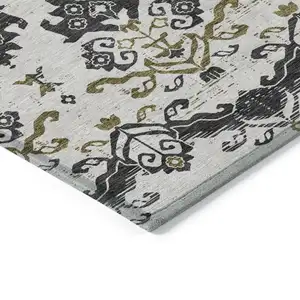 Photo of Black Beige And Gold Oriental Washable Indoor Outdoor Area Rug