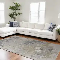 Photo of Black Brown and Off White Abstract Area Rug