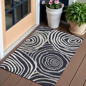 Photo of Black Charcoal And Gray Abstract Washable Indoor Outdoor Area Rug