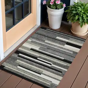 Photo of Black Charcoal And Gray Striped Washable Indoor Outdoor Area Rug