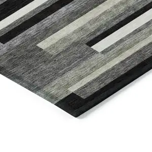 Photo of Black Charcoal And Gray Striped Washable Indoor Outdoor Area Rug