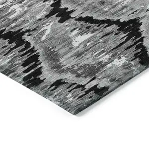 Photo of Black Charcoal And Silver Abstract Washable Indoor Outdoor Area Rug