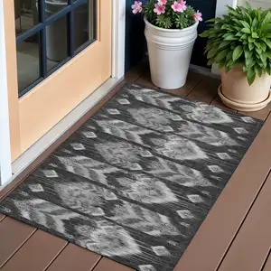 Photo of Black Charcoal And Silver Southwestern Washable Indoor Outdoor Area Rug