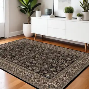 Photo of Black Dark Green And Ivory Oriental Area Rug