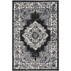 Photo of Black Floral Power Loom Distressed Area Rug