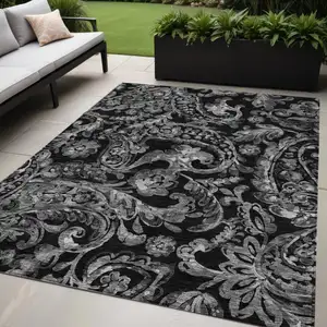 Photo of Black Gray And Charcoal Paisley Washable Indoor Outdoor Area Rug