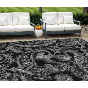 Photo of Black Gray And Charcoal Paisley Washable Indoor Outdoor Area Rug