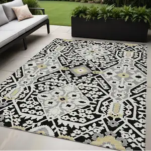 Photo of Black Gray And Gold Floral Washable Indoor Outdoor Area Rug